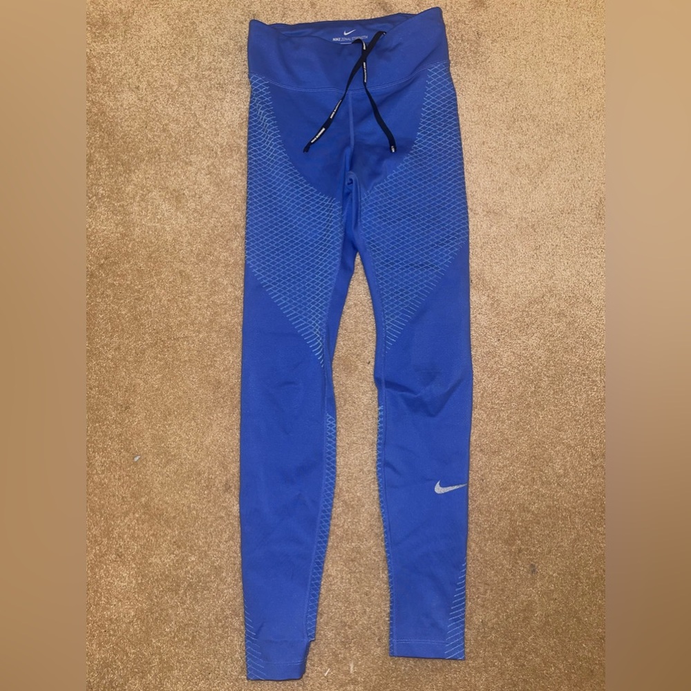 Nike blue leggings with detailing